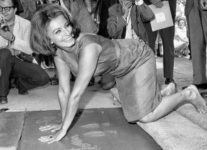 Sophia gets her hands dirty in Hollywood in front of Grauman Chinese theater